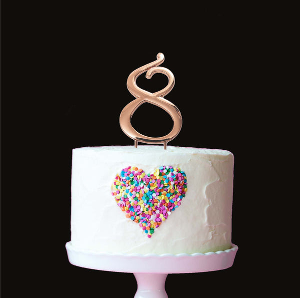 Metal cake topper with the number 8 in Rose Gold