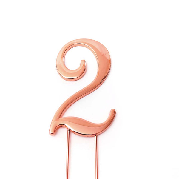 Metal cake topper with the number 2 in Rose Gold