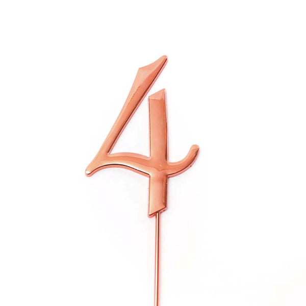 Metal cake topper with the number 4 in Rose Gold