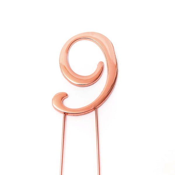 Metal cake topper with the number 9 in Rose Gold