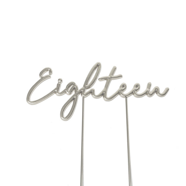 Metal cake topper with the word Eighteen in Silver