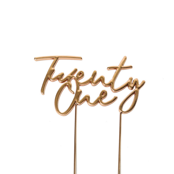 Metal cake topper with the words Twenty One in Rose Gold